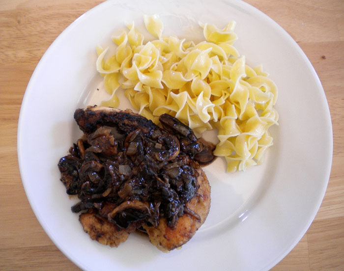 Sauteed chicken breasts with balsamic vinegar pan sauce and noodles with butter and parmesean.